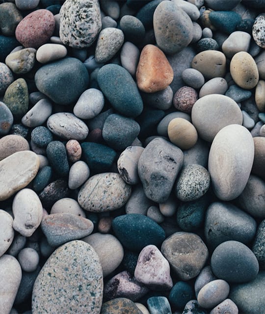 Grey pebbles on a beach